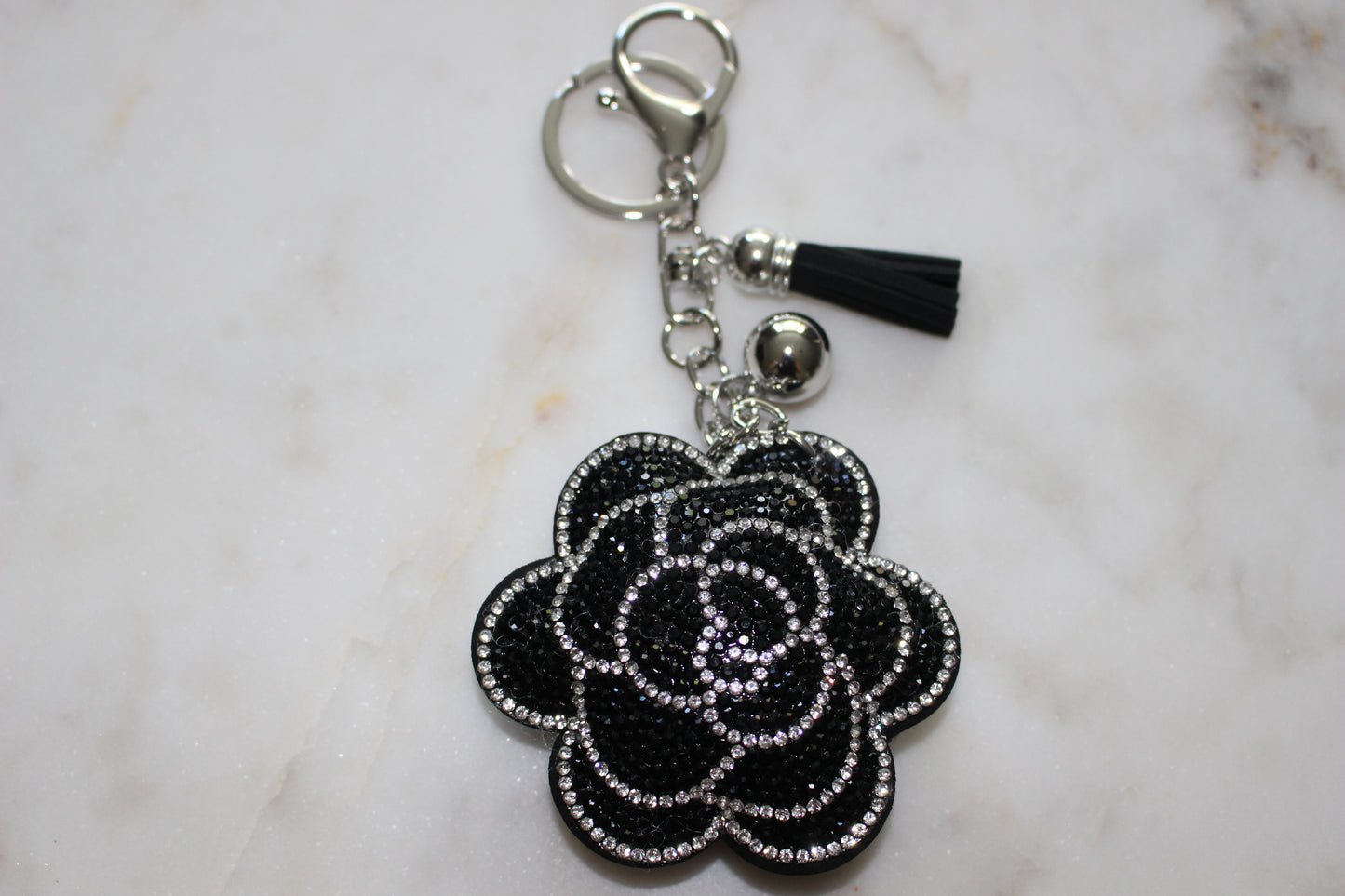 black flower bag charm