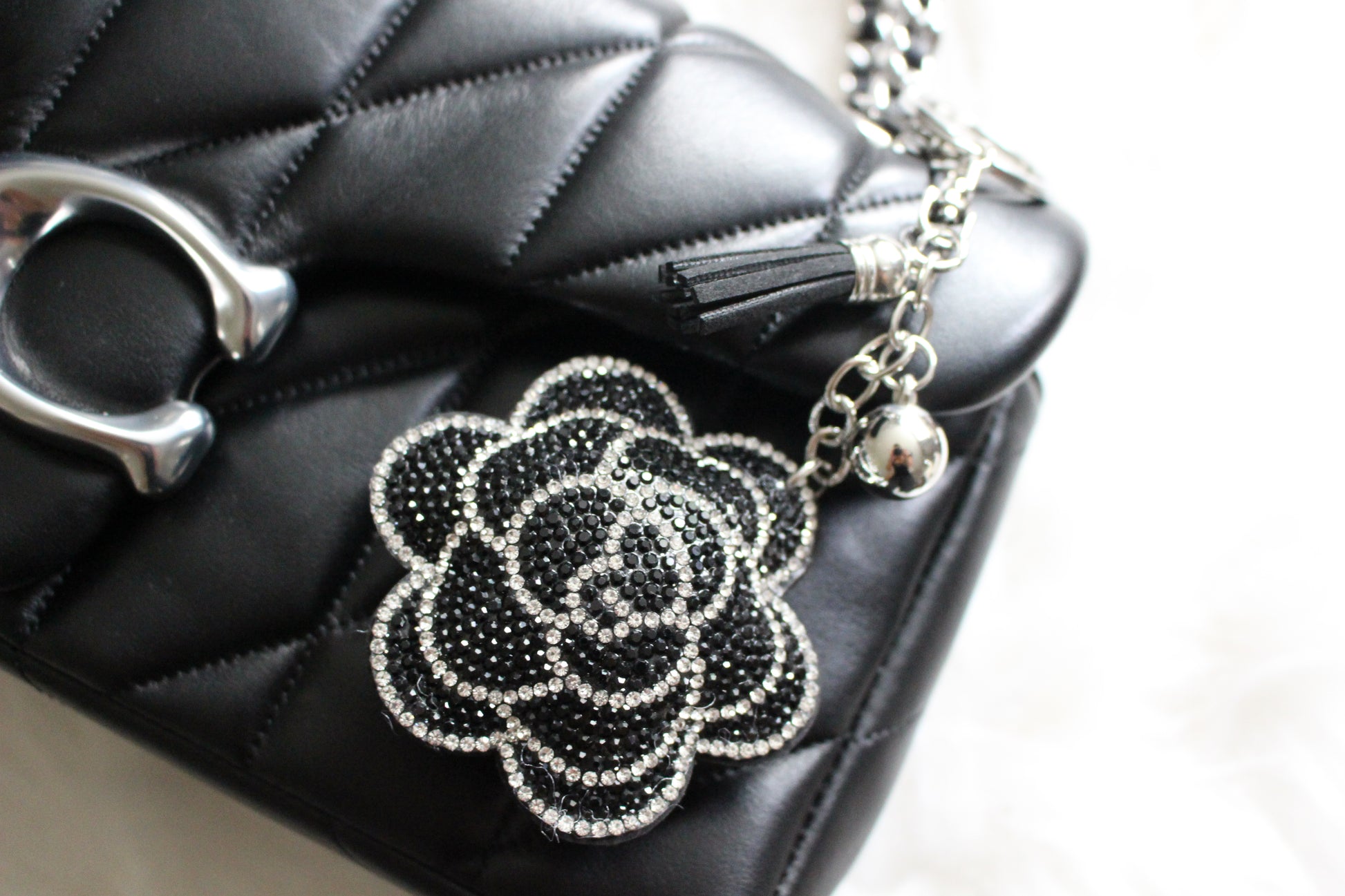 black flower carnelian bag charm